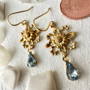 Bordeaux Brass Flower Charm Earrings with Light Sapphire Crystal Drops