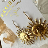 Soleil Raw Brass Sun Face Drop Earrings