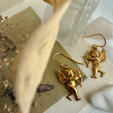 "The Amores" Raw Brass Cupid Drop Earrings