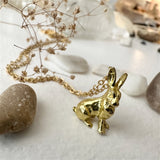 Basil Hare Charm Necklace in Raw Brass